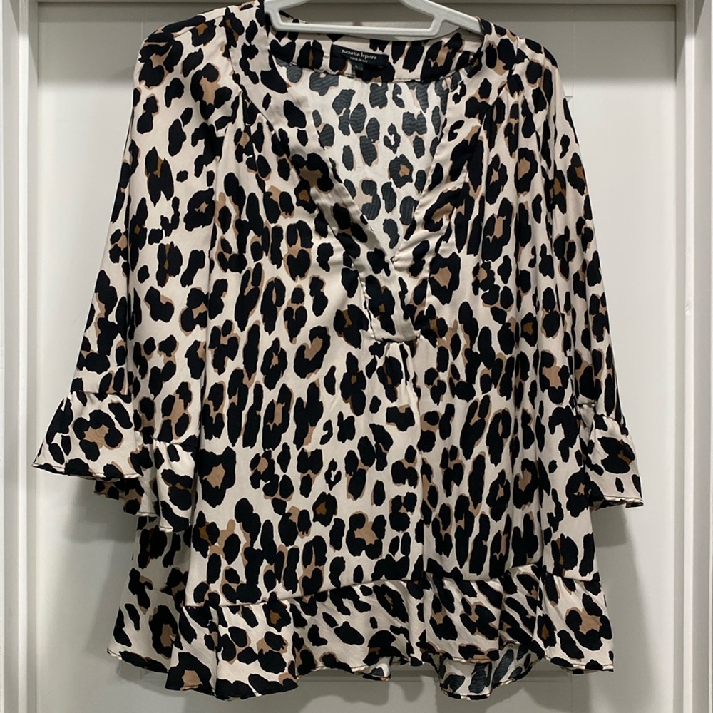 Gorgeous leopard print flouncy blouse.